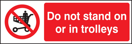 Do not stand on or in trolleys sign