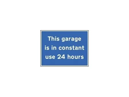 This garage is in constant use 24 hours sign