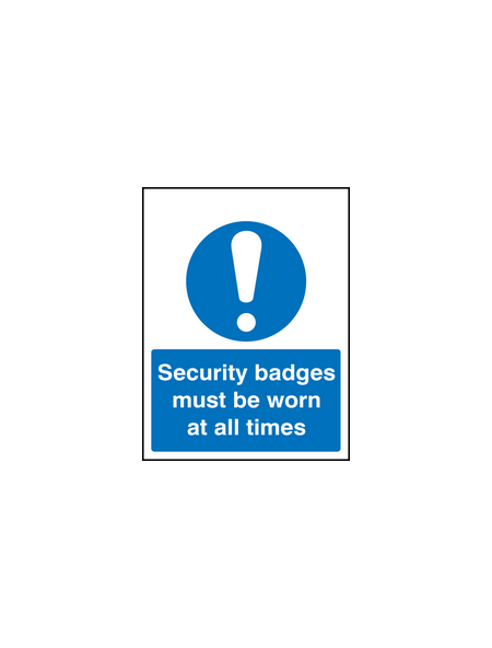 Security badges must be worn all times sign
